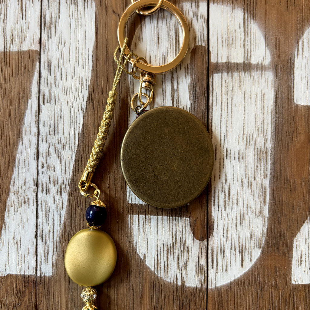 駿河三景・旅の標（しるべ）。和紙バッチ・皿カン古金美の裏側の写真