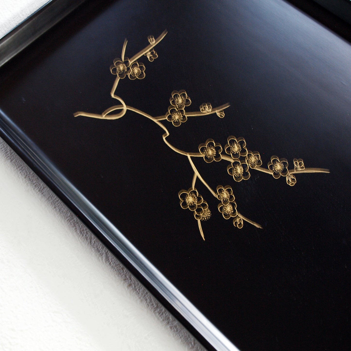 Tray, wooden long tray with gold-painted plum blossom design, black lacquer, warped