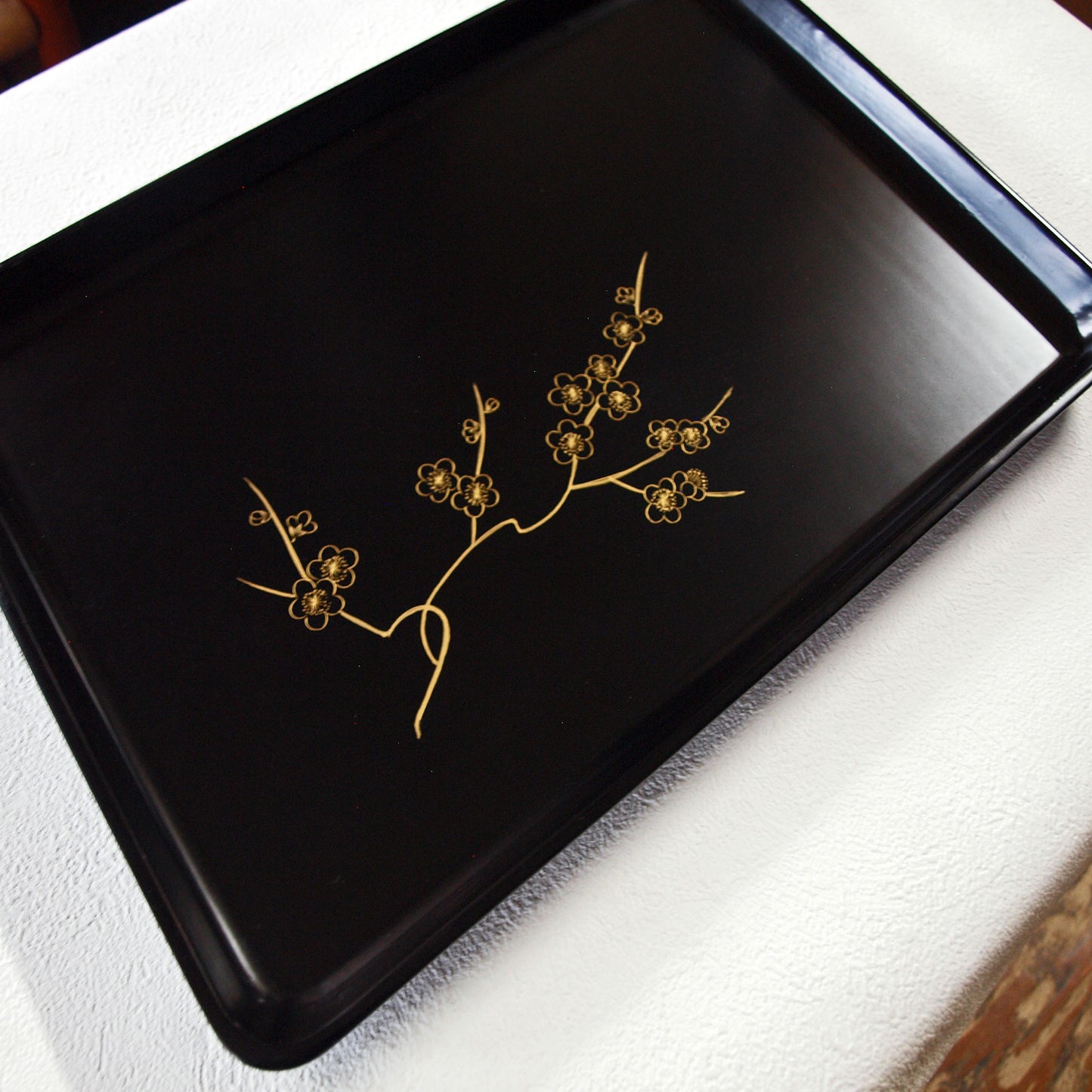 Tray, wooden long tray with gold-painted plum blossom design, black lacquer, warped